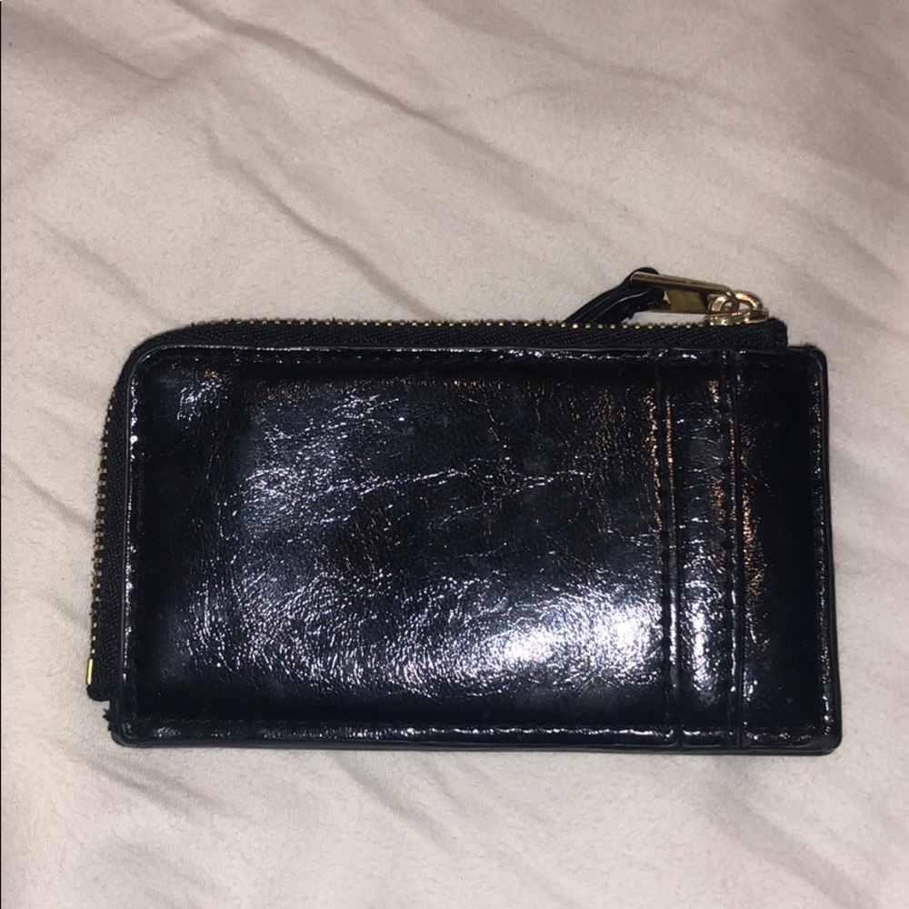 Small black leather wallet with gold zipper